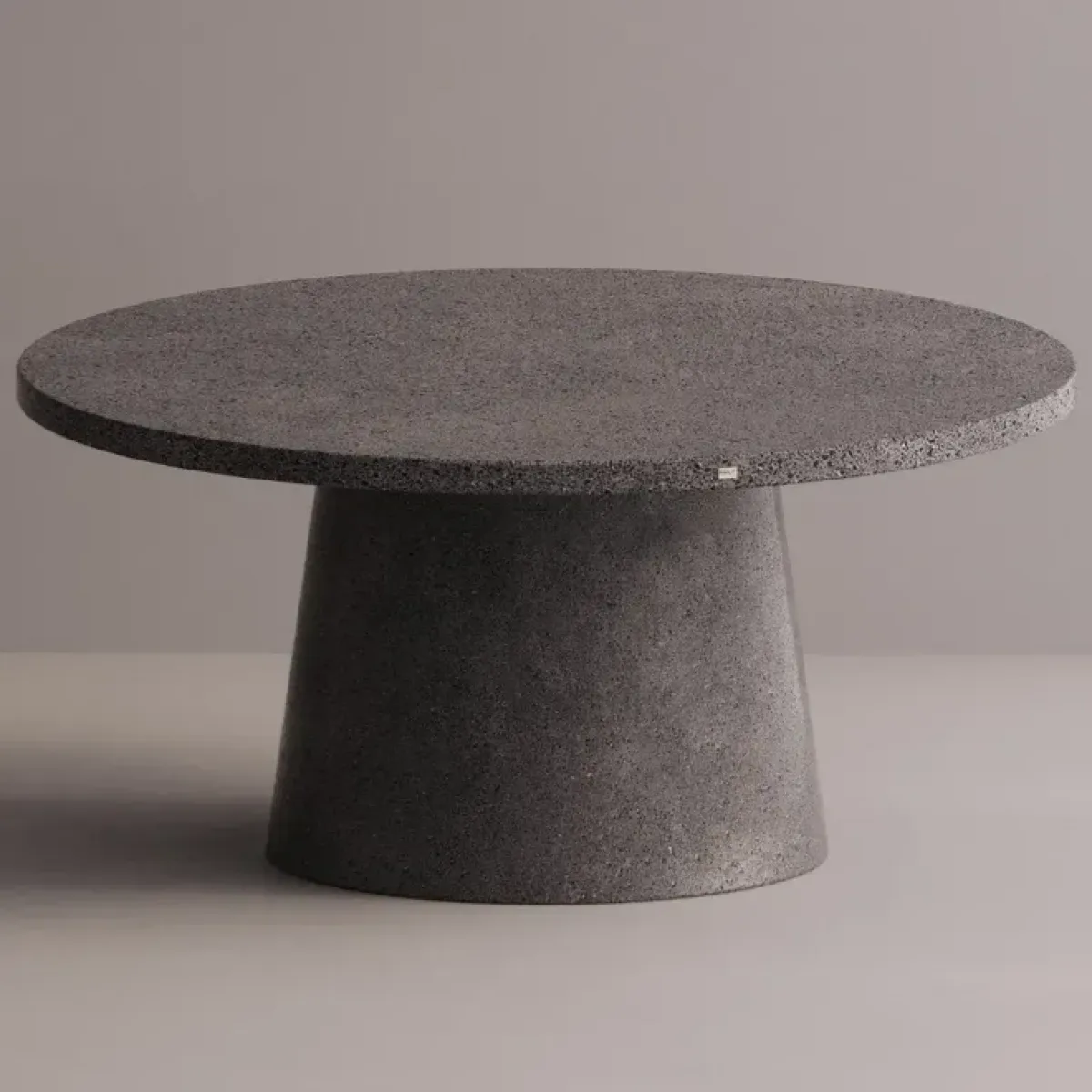 Luxury Round Pedestal Dining Table in Tan matte stone-look with speckled top by Luxury Group International