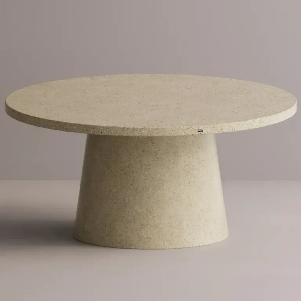Luxury Round Pedestal Dining Table in Tan matte stone-look with speckled top by Luxury Group International
