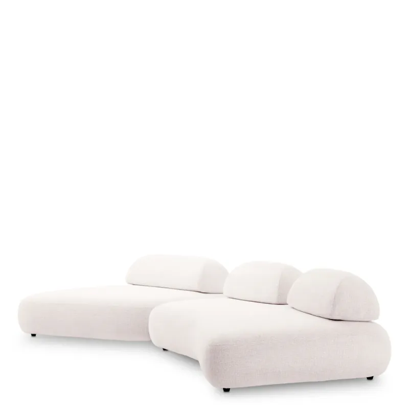Canapé Modulaire Courbé Crème de Luxe avec Coussins de Dossier Sculpturaux - Mobilier de Luxe pour Hôtels Vue de face par Luxury Group International