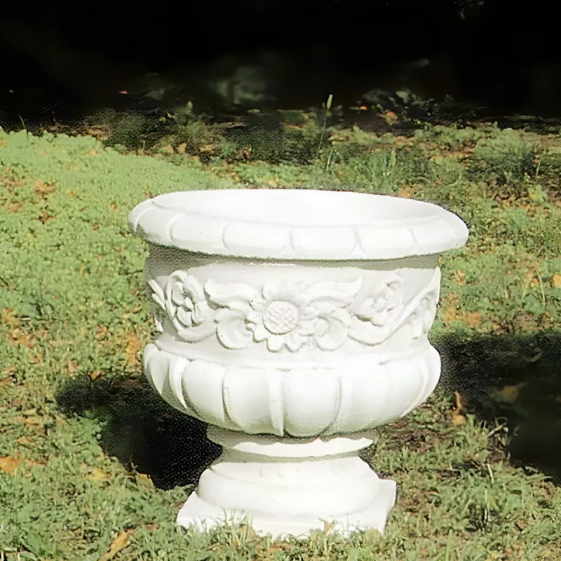 Luxury Round Garden Planter with Sculpted Floral Relief and Pedestal Base Front View by Luxury Group International