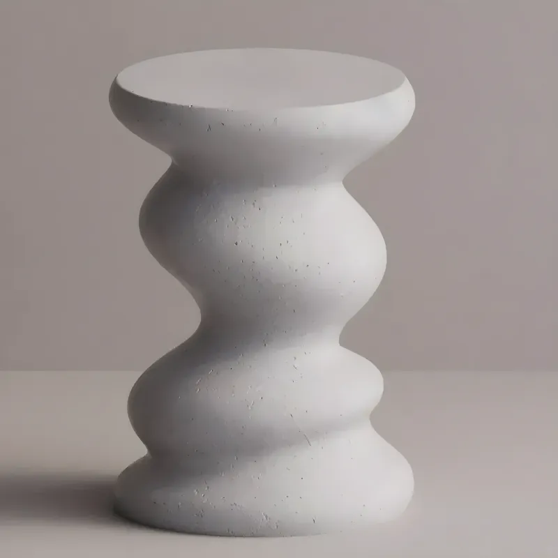 Luxury sculptural concrete side table with wavy scalloped design - Luxury hotel furniture by Luxury Group International