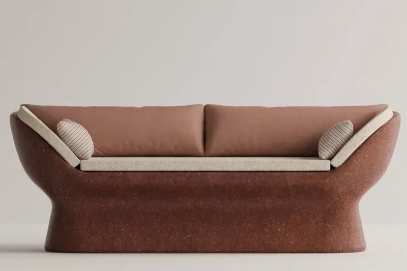 Ruby Red Luxury Concrete Sofa with Curved Arms and Terracotta Cushions - Luxury Hotel Furniture Front View by Luxury Group International