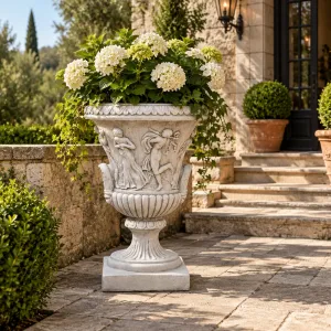 Baroque Classical Urn Garden Planter with Sculpted Figure Ornamentation - Luxury Planters Lifestyle View by Luxury Group International