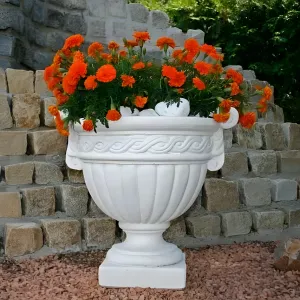 Luxury Garden Planter with Fluted Bowl Design and Decorative Scroll Border Lifestyle View by Luxury Group International