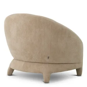 Beige Textured Fabric Lounge Chair with Curved Backrest and Sculptural Legs - Luxury Hotel Furniture Back View by Luxury Group International