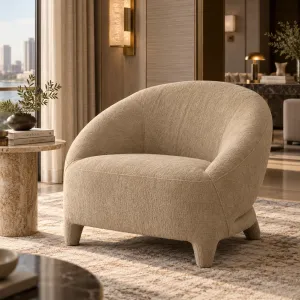 Beige Textured Fabric Lounge Chair with Curved Backrest and Sculptural Legs - Luxury Hotel Furniture Lifestyle View by Luxury Group International