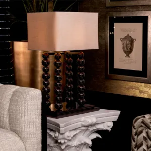 Black Decorative Table Lamp with Sculptural Sphere Columns and Cream Shade-Luxury Hotel Furniture Lifestyle View by Luxury Group International