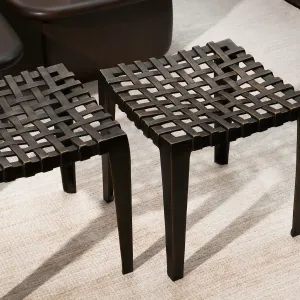 Taburete de metal negro con asiento trenzado y estructura escultural - Mobiliario de lujo para hoteles Vista lifestyle por Luxury Group International