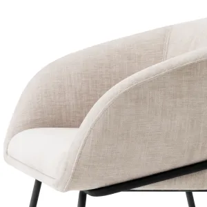 Cream Fabric Dining Chair with Curved Backrest and Black Metal Legs - Luxury Hotel Furniture Detail View by Luxury Group International