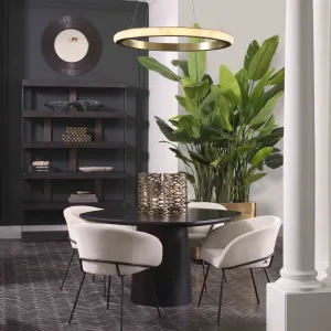 Cream Fabric Dining Chair with Curved Backrest and Black Metal Legs - Luxury Hotel Furniture Lifestyle View by Luxury Group International