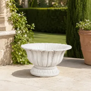 Decorative Fluted Bowl Garden Planter with Sculptural Pedestal Design - Luxury Planters Lifestyle View by Luxury Group International