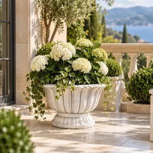 Decorative Fluted Bowl Garden Planter with Sculptural Pedestal Design - Luxury Planters Lifestyle View by Luxury Group International