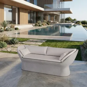 Grey Luxury Concrete Outdoor Sofa with White Upholstered Cushions- Outdoor Furniture Lifestyle View by Luxury Group International