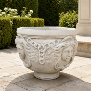 Large Decorative Garden Planter with Sculpted Face Motifs - Luxury Planters Lifestyle View by Luxury Group International