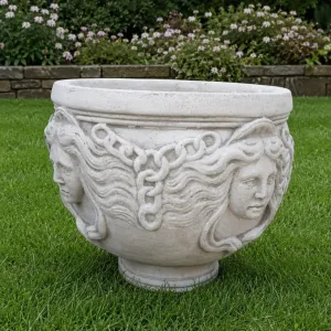 Large Decorative Garden Planter with Sculpted Face Motifs - Luxury Planters Lifestyle View by Luxury Group International