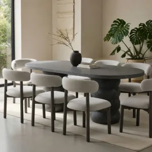 Luxury Anthracite Oval Concrete Dining Table with Sculptural Pedestal Base Lifestyle View by Luxury Group International