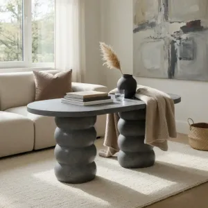 Luxury Anthracite Oval Concrete Dining Table with Sculptural Pedestal Base Lifestyle View by Luxury Group International