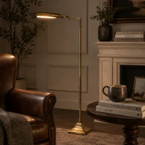 Luxury Antique Brass Adjustable Task Floor Lamp with Directional Light Lifestyle View by Luxury Group International
