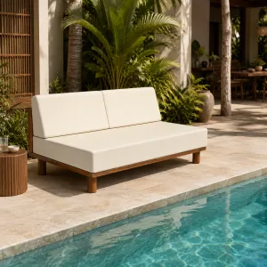 Luxury Armless Two-Seater Teak Outdoor Sofa with Deep Cushions Lifestyle View by Luxury Group International