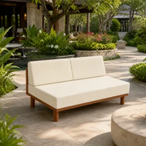 Luxury Armless Two-Seater Teak Outdoor Sofa with Deep Cushions Lifestyle View by Luxury Group International