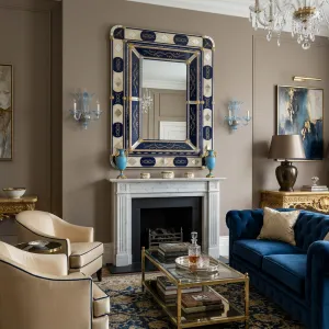 Luxury Baroque Venetian Style Wall Mirror with Royal Blue Glass Panels & Gold Rosette Accents Lifestyle View by Luxury Group International