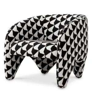 Sillón escultural de lujo con motivos geométricos en blanco y negro - Mobiliario de lujo para hoteles Vista frontal por Luxury Group International