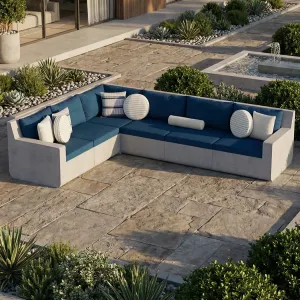 Sofá de Exterior en Forma de L de Concreto Azul de Lujo con Tapicería de Tela - Muebles Modernos Vista lifestyle por Luxury Group International