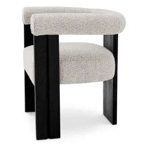 Modern Boucle Armchair with Black Wooden Frame and Rounded Upholstered Design - Luxury Dining Chair Side View by Luxury Group International