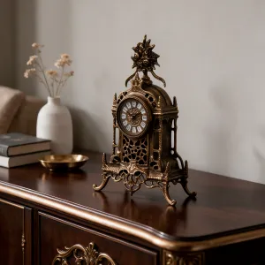 Luxury Bronze Table Clock with Ornate Floral Crest and Openwork Baroque Frame Lifestyle View by Luxury Group International