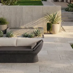 Luxury Charcoal Grey Concrete Sofa with Cream Upholstery - Outdoor Furniture Lifestyle View by Luxury Group International