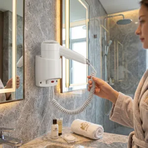 Luxury Compact Hotel Hair Dryer with Vertical Wall Mount Lifestyle View by Luxury Group International