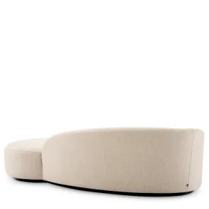 Canapé rembourré incurvé crème de luxe avec design sculptural en chaise longue - Canapé de luxe Vue de dos par Luxury Group International