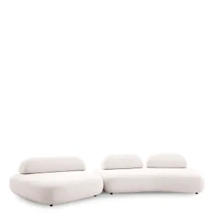 Canapé Modulaire Courbé Crème de Luxe avec Coussins de Dossier Sculpturaux - Mobilier de Luxe pour Hôtels Vue de face par Luxury Group International