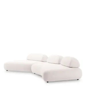 Canapé Modulaire Courbé Crème de Luxe avec Coussins de Dossier Sculpturaux - Mobilier de Luxe pour Hôtels Vue de face par Luxury Group International