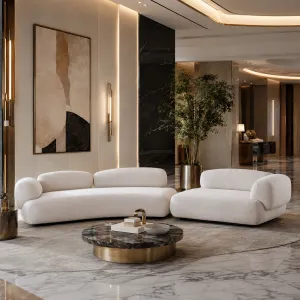 Canapé d'angle modulaire crème de luxe au design sculptural courbé - Mobilier de luxe pour hôtels Vue lifestyle par Luxury Group International
