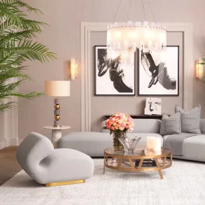 Sillón escultural de lujo en color crema con base de oro cepillado - Sillón de lujo Vista lifestyle por Luxury Group International