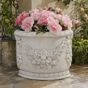 Luxury Decorative Corner Garden Planter with Sculptural Floral Relief Design Lifestyle View by Luxury Group International