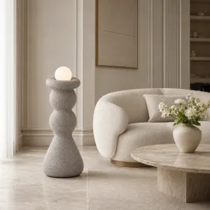 Lampadaire de luxe design avec base en grès sculptural et globe en verre Vue lifestyle par Luxury Group International