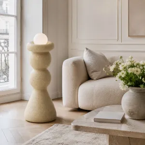 Luxury Designer Floor Lamp with Sculptural Stoneware Base and Glass Globe Lifestyle View by Luxury Group International