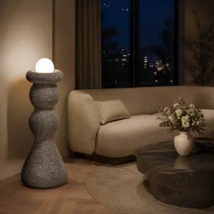 Luxury Designer Floor Lamp with Sculptural Stoneware Base and Glass Globe Lifestyle View by Luxury Group International