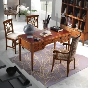 Escritorio Ejecutivo de Lujo con Tapa de Cuero Rojo y Almacenamiento de Cinco Cajones en Acabado de Madera Maciza Vista lifestyle por Luxury Group International