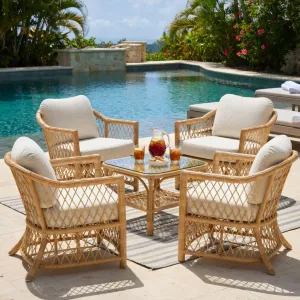 Luxury Faux Rattan Outdoor Lounge Chair with Arden Natural Cushions Lifestyle View by Luxury Group International