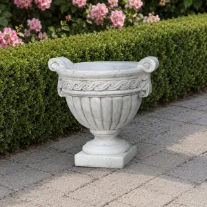 Luxury Garden Planter with Fluted Bowl Design and Decorative Scroll Border Lifestyle View by Luxury Group International