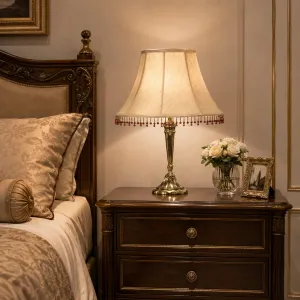 Luxury Golden Bronze Table Lamp with Cream Bell Shade and Ruby Bead Fringe - Luxury Table Lamp Lifestyle View by Luxury Group International