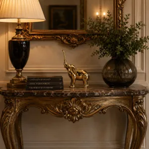 Luxury Golden Mini Elephant Bronze Sculpture with Raised Trunk Lifestyle View by Luxury Group International