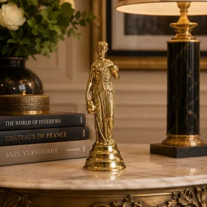 Luxury Lady Figure Bronze Sculpture on Tiered Base in Golden Finish Lifestyle View by Luxury Group International