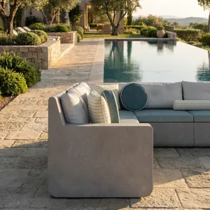 Sofá Exterior en Forma de L de Concreto Gris Claro de Lujo con Cojines Turquesa - Mobiliario de Hotel de Lujo Vista lifestyle por Luxury Group International