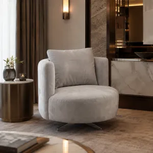 Luxury Light Grey Velvet Swivel Armchair with Curved Design -Luxury Armchair -Luxury Hotel Furniture Lifestyle View by Luxury Group International