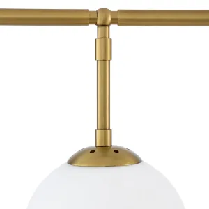 Lampada a Sospensione Lineare di Lusso con Quattro Sfere in Metallo Lucido Oro Spazzolato Vista dettaglio di Luxury Group International