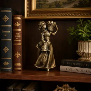 Luxury Maiden Bronze Sculpture with Raised Harvest Basket - Luxury Bronze Figure Lifestyle View by Luxury Group International